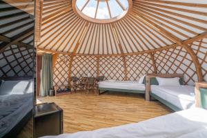 Ένα ή περισσότερα κρεβάτια σε δωμάτιο στο Imperial Mount Resort