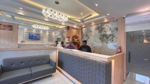 Χώρος καθιστικού στο Hotel Suvidha Residency