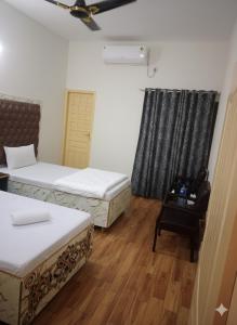 Imagem da galeria de Hilton Family Guest House em Lahore