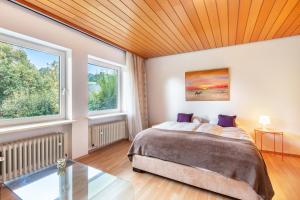 Ένα ή περισσότερα κρεβάτια σε δωμάτιο στο Haus Vita Ferien-und Seminarhaus