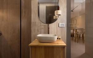 a bathroom with a sink and a mirror on a counter at נופש ספיר אילת romantic in Eilat