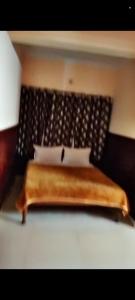 Postel nebo postele na pokoji v ubytování SBM Lodge + 1 fotografie