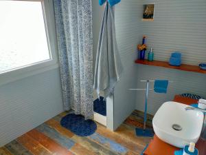a bathroom with a toilet and a shower with a window at Casa Adriana Fronte Mare in Monopoli +46 photos