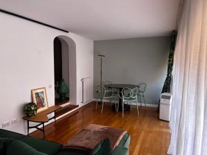 a living room with a couch and a table at 30 Seconds from Pantheon Walk Everywhere in Rome