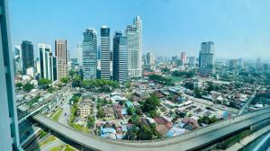 an aerial view of a city with tall buildings at Majestic Luxury Residence by KLCC in Kuala Lumpur