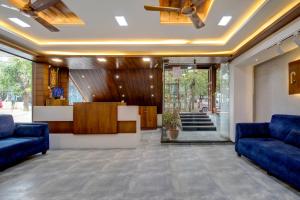 Un lugar para sentarse en Hotel Cocoon Suites Kalyan Nagar