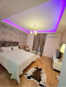 Postel nebo postele na pokoji v ubytování Princess apartman