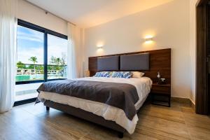 Postel nebo postele na pokoji v ubytování La Stuga del Mar - Walk to Portillo Beach, Terrenas