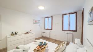 Kuchyň nebo kuchyňský kout v ubytování La Casa di Clelia by Ca-Sa Check