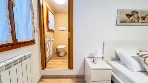 Koupelna v ubytování La Casa di Clelia by Ca-Sa Check + 17 fotografií