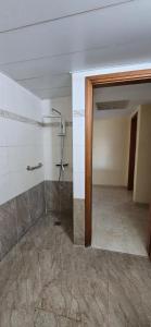 an empty bathroom with a shower in a room at New on site !! cozy apartment with full sea view in Eilat