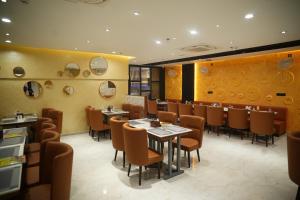 Posezení v ubytování Hotel Devki Inn