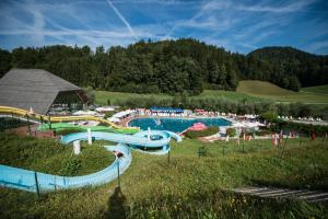 a large water park with a water slide at Altitude50 apartment Domžale in Domžale