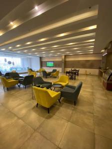 Ruang duduk di فندق 180 للوحدات السكنيه المفروشة