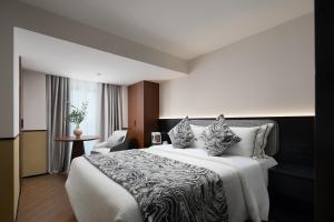 Fotografie z fotogalerie ubytování Suisse place Chunxi Taikoo Chengdu Serviced Apartments v destinaci Čcheng-tu