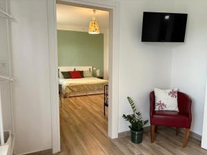 a room with a bedroom with a bed and a mirror at B&B Il giardino segreto in Guarda Ferrarese +44 photos