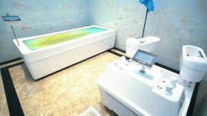 Shox Reabilitatsiya va Sanatoriya markaziにあるバスルーム