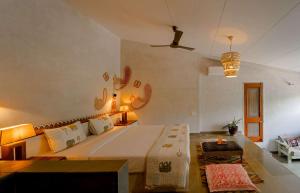a bedroom with a large bed in a room at Tehla Bagh in Tehla +119 photos