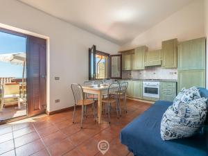 Η κουζίνα ή μικρή κουζίνα στο Coastal Apartments - Dream