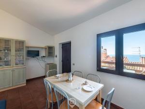 Η κουζίνα ή μικρή κουζίνα στο Coastal Apartments - Dream