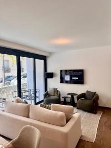 O zonă de relaxare la Stylish 2BR Monaco Border Flat, Terrace & Parking