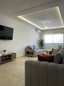 Televiisor ja/või meelelahutuskeskus majutusasutuses Appartement prestige gueliz