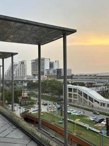 a view of a city with a train station at Easy Stayz - Premium stays in Greater Noida in Greater Noida