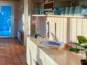a counter with a bowl on top of it at 4 star holiday home in Nordborg in Nordborg