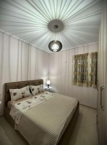 Postel nebo postele na pokoji v ubytování 5 Star Apartment