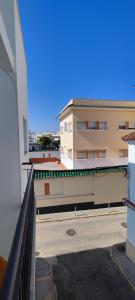 a view from the balcony of a building at Dúplex con solárium privado junto al Ayuntamiento de Barbate in Barbate