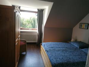 Katil atau katil-katil dalam bilik di Ferienwohnung Bonny +4 gambar