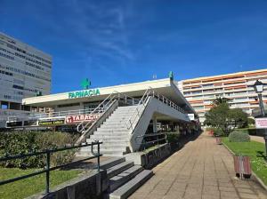 a building with stairs in front of a building at Playa Sardinero Little Homes 6 in Santander