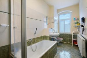 Koupelna v ubytování Ferienwohnung Am Schunckpark + 12 fotografií
