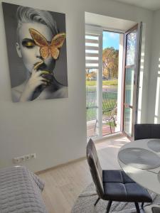 Posezení v ubytování Pilkų atspalvių apartamentai