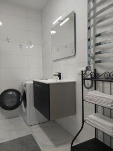 Koupelna v ubytování Pilkų atspalvių apartamentai