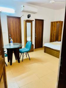 Postel nebo postele na pokoji v ubytování Kings Court Hotel Panchsheel Park