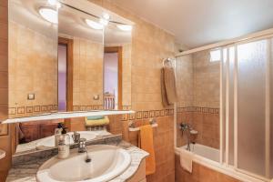 a bathroom with a sink and a shower at El Rellano in Maluenda +14 photos