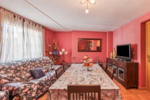 a living room with a couch and a table at Casa Maluenda in Maluenda
