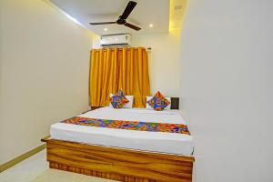 Postel nebo postele na pokoji v ubytování Via Ashiyana