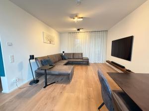 Μια τηλεόραση ή/και κέντρο ψυχαγωγίας στο Premium Stay Essen near Messe