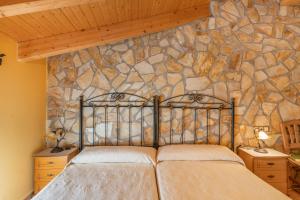 Postel nebo postele na pokoji v ubytování El Ático