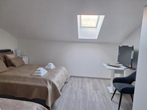 Ένα ή περισσότερα κρεβάτια σε δωμάτιο στο Studio Apartmani