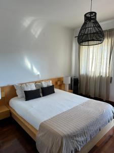 Ένα ή περισσότερα κρεβάτια σε δωμάτιο στο Quinta da Mina 31