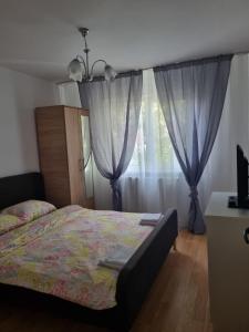Ένα ή περισσότερα κρεβάτια σε δωμάτιο στο Park Avenue 3 +1 φωτογραφίες