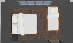 a room with two bunk beds and a window at Krabi Boxtel in Krabi town
