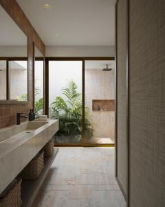 a bathroom with two sinks and a large window at Casa Simona in Valle de Anton