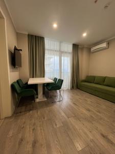 Posezení v ubytování Greenside Aparthotel 802