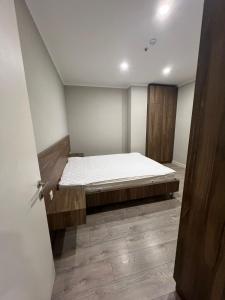 Postel nebo postele na pokoji v ubytování Greenside Aparthotel 802