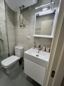 Koupelna v ubytování Greenside Aparthotel 802