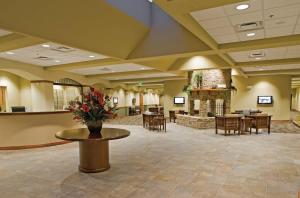 a lobby with a waiting room with tables and chairs at Wyndham Fairfield Glade 2BR 2BA Apartment with resort Access in Fairfield Glade